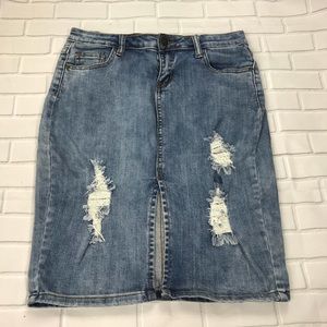 Machine light wash distressed jean skirt